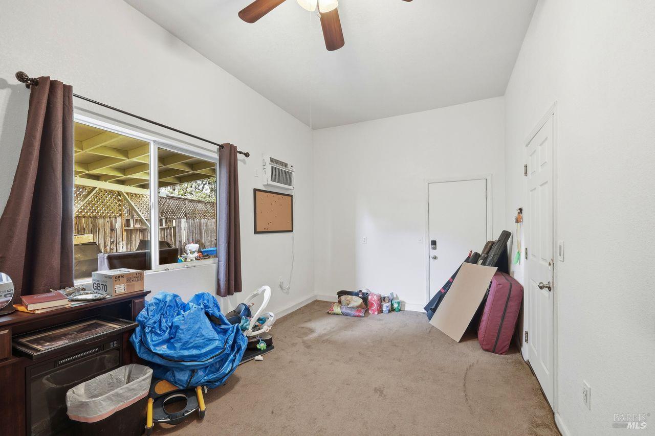 164 Fulton Place Windsor, CA 95492 - Photo 35 of 50 a bedroom with furniture and a large window