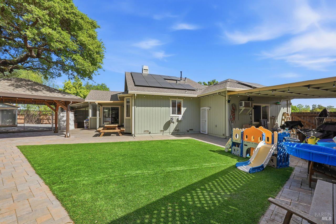 164 Fulton Place Windsor, CA 95492 - Photo 37 of 50 a view of a house with a yard and furniture