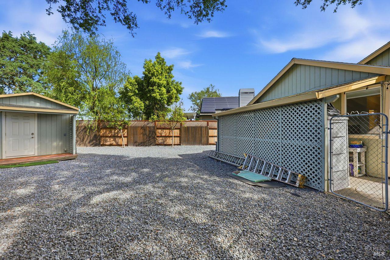 164 Fulton Place Windsor, CA 95492 - Photo 47 of 50 a view of a house with a yard and garage