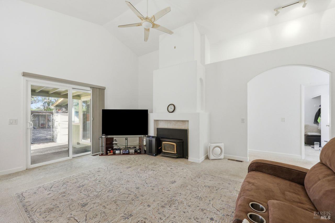 164 Fulton Place Windsor, CA 95492 - Photo 7 of 50 a living room with furniture and a fireplace