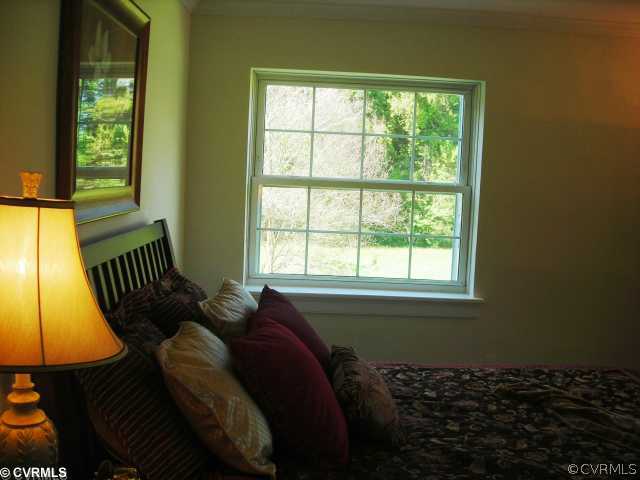 9131 Rutland Road Mechanicsville, VA 23116 - Photo 8 of 12 Master Bedroom - LARGE FIRST FLOOR MASTER ADJ HALL BATH...PLENTY OF WINDOWS.