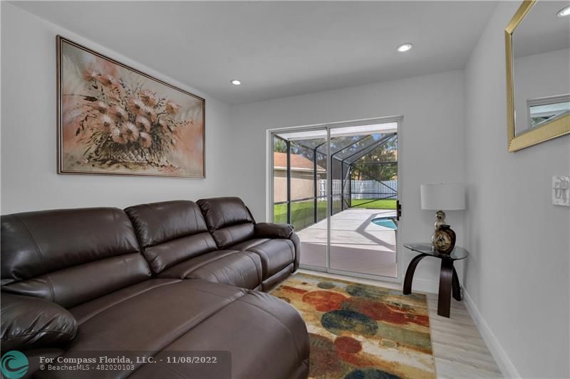 22341 Sea Bass Drive Boca Raton, FL 33428 - Photo 21 of 52 a living room with furniture and a window