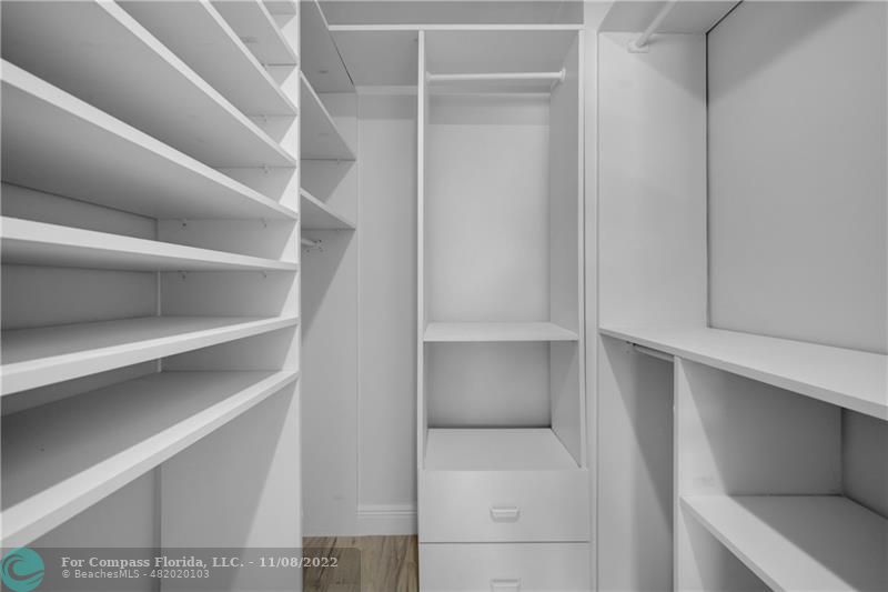 22341 Sea Bass Drive Boca Raton, FL 33428 - Photo 25 of 52 a view of walk in closet with empty racks