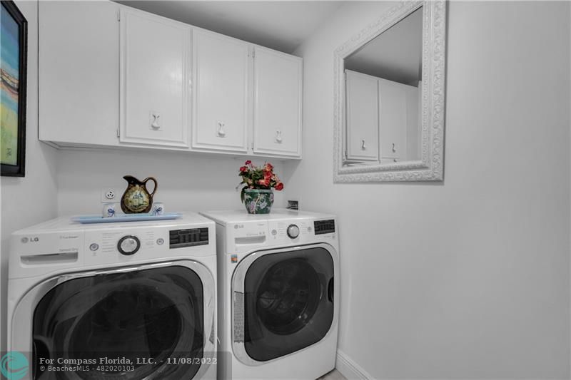 22341 Sea Bass Drive Boca Raton, FL 33428 - Photo 33 of 52 a utility room with dryer and washer