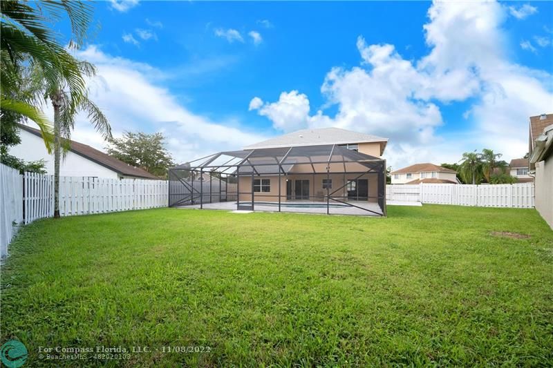 22341 Sea Bass Drive Boca Raton, FL 33428 - Photo 41 of 52 a view of a house with a backyard