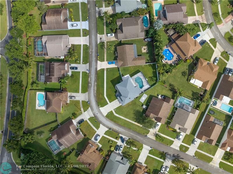 22341 Sea Bass Drive Boca Raton, FL 33428 - Photo 44 of 52 an aerial view of residential houses with outdoor space