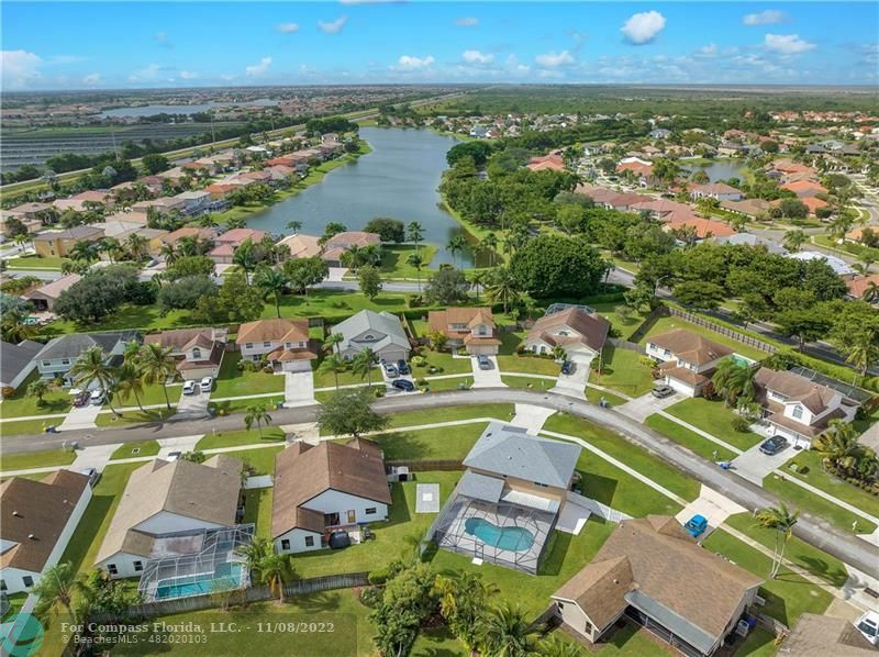 22341 Sea Bass Drive Boca Raton, FL 33428 - Photo 46 of 52 an aerial view of residential houses with outdoor space