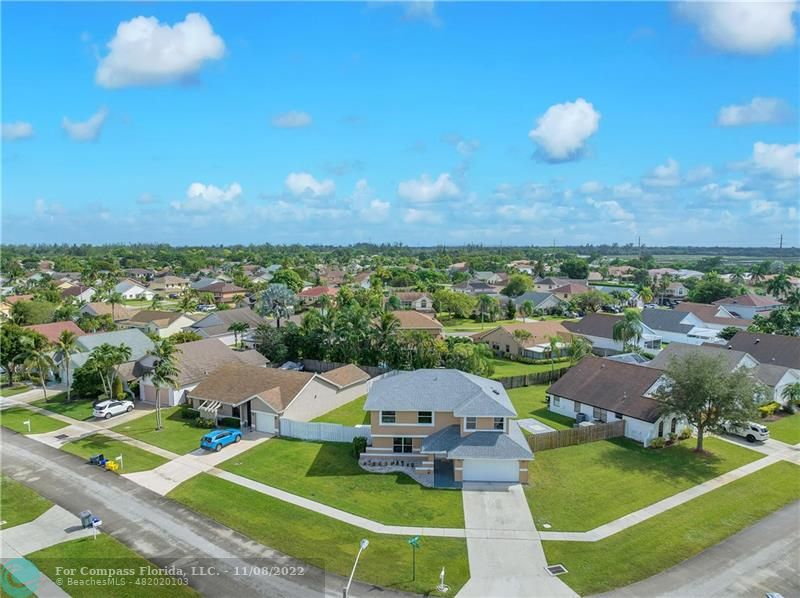 22341 Sea Bass Drive Boca Raton, FL 33428 - Photo 8 of 52 an aerial view of a house with a garden