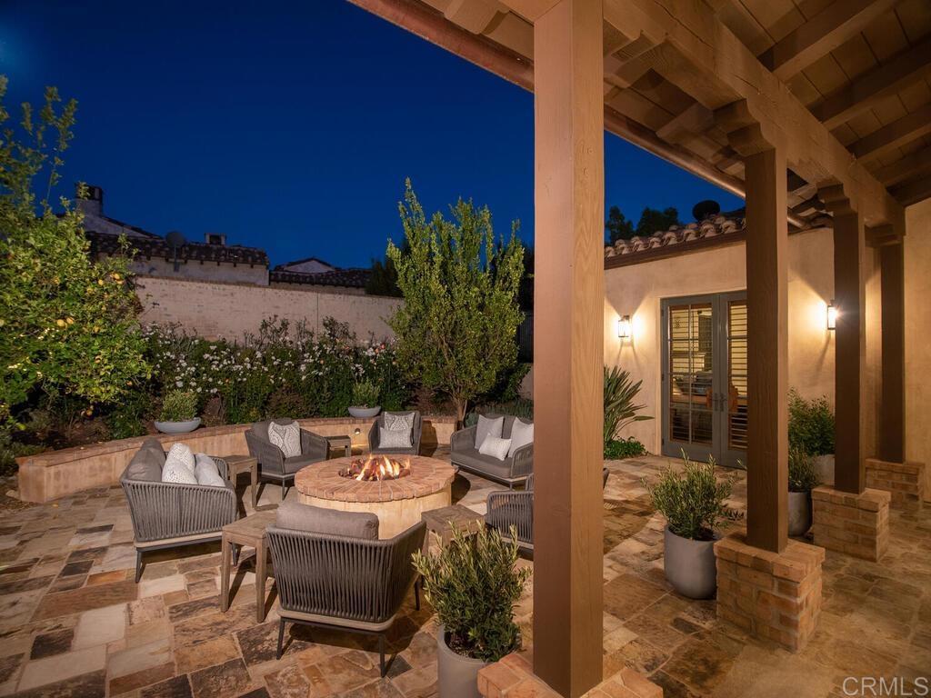 4272 Via Ravello Rancho Santa Fe, CA 92091 - Photo 55 of 58 a view of a patio with couple of chairs and potted plants