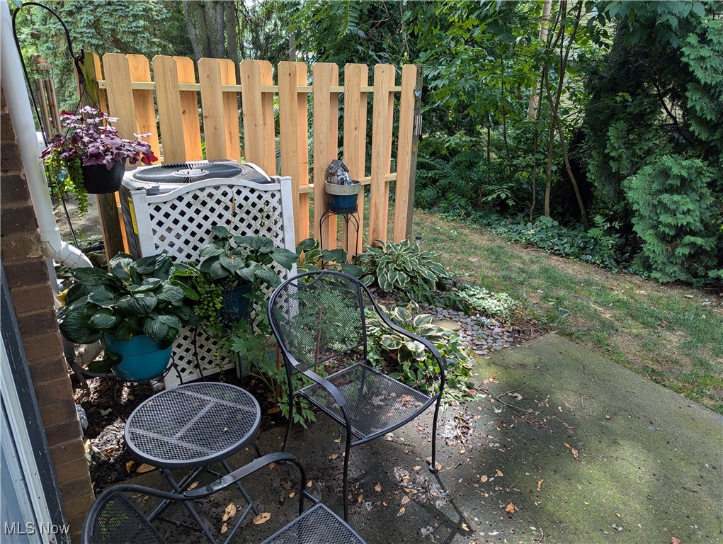 2500 Cleveland Road, Unit 202 Wooster, OH 44691 - Photo 7 of 22 View of patio featuring central AC