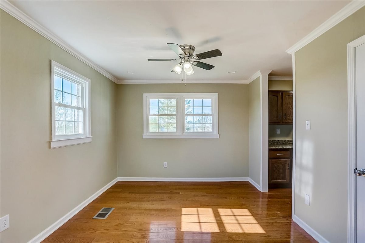 555 White Road Portland, TN 37148 - Photo 12 of 30 a view of empty room with windows and ceiling fan