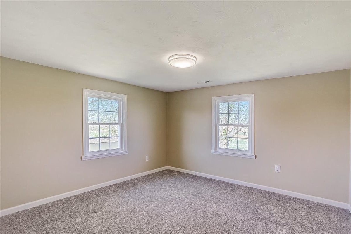 555 White Road Portland, TN 37148 - Photo 18 of 30 an empty room with windows