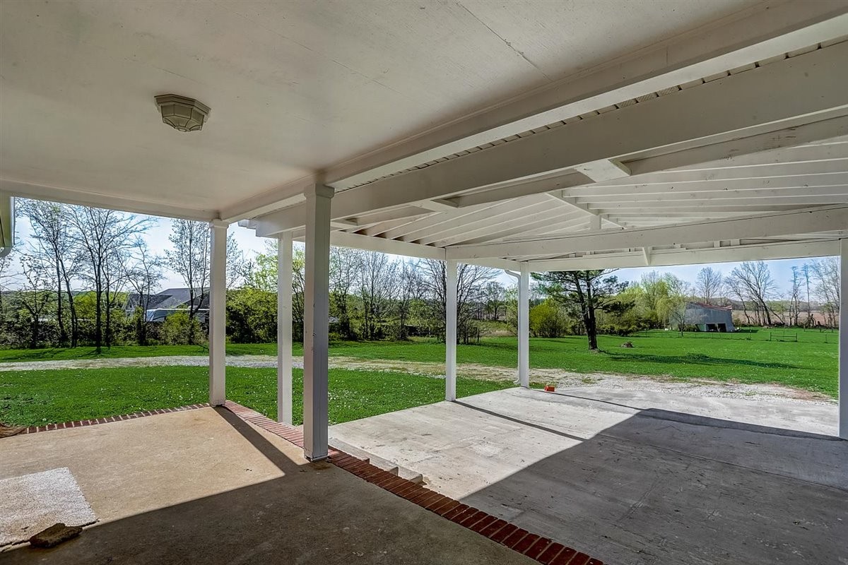 555 White Road Portland, TN 37148 - Photo 24 of 30 a view of a house with backyard and porch