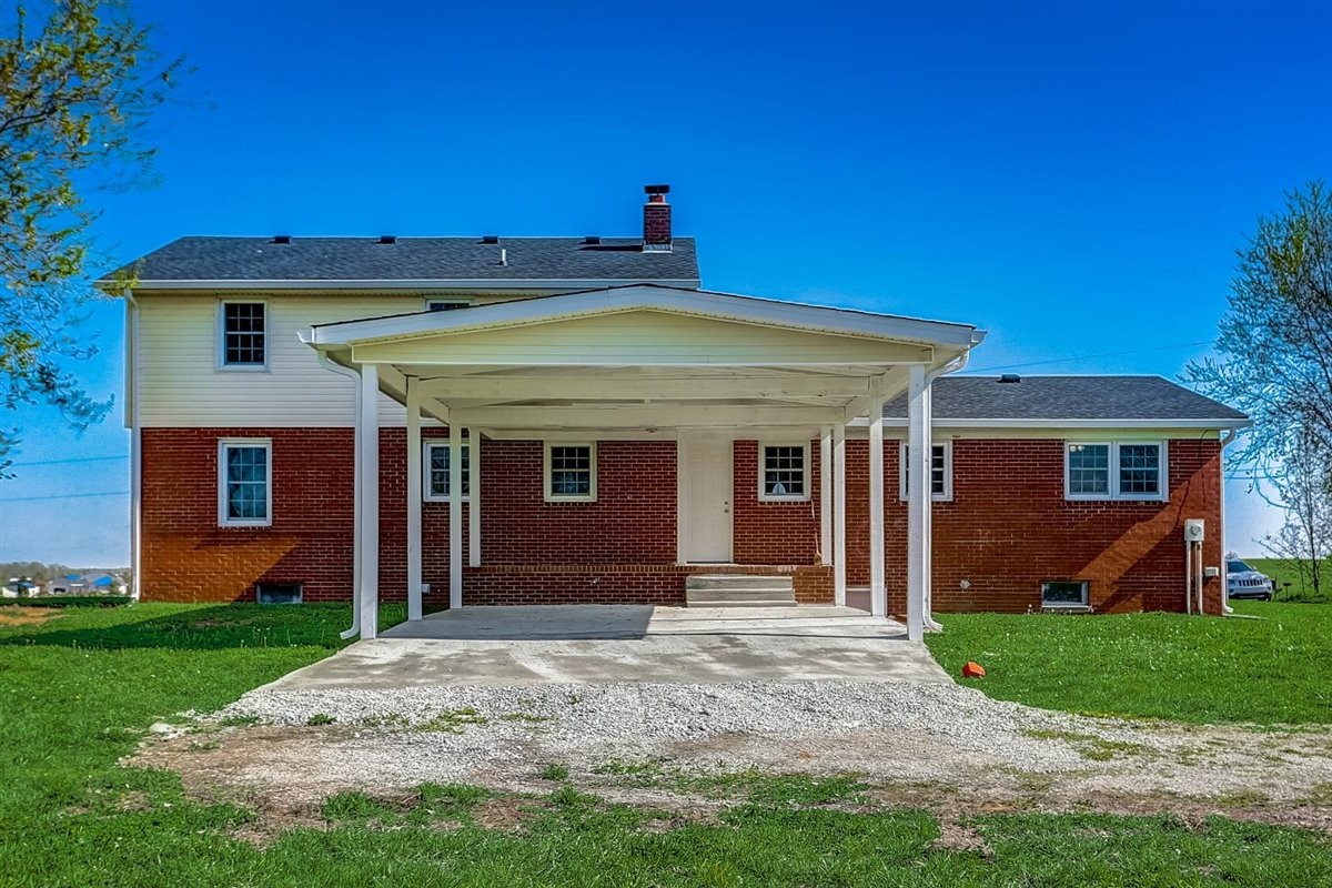 555 White Road Portland, TN 37148 - Photo 26 of 30 a view of a house with a yard