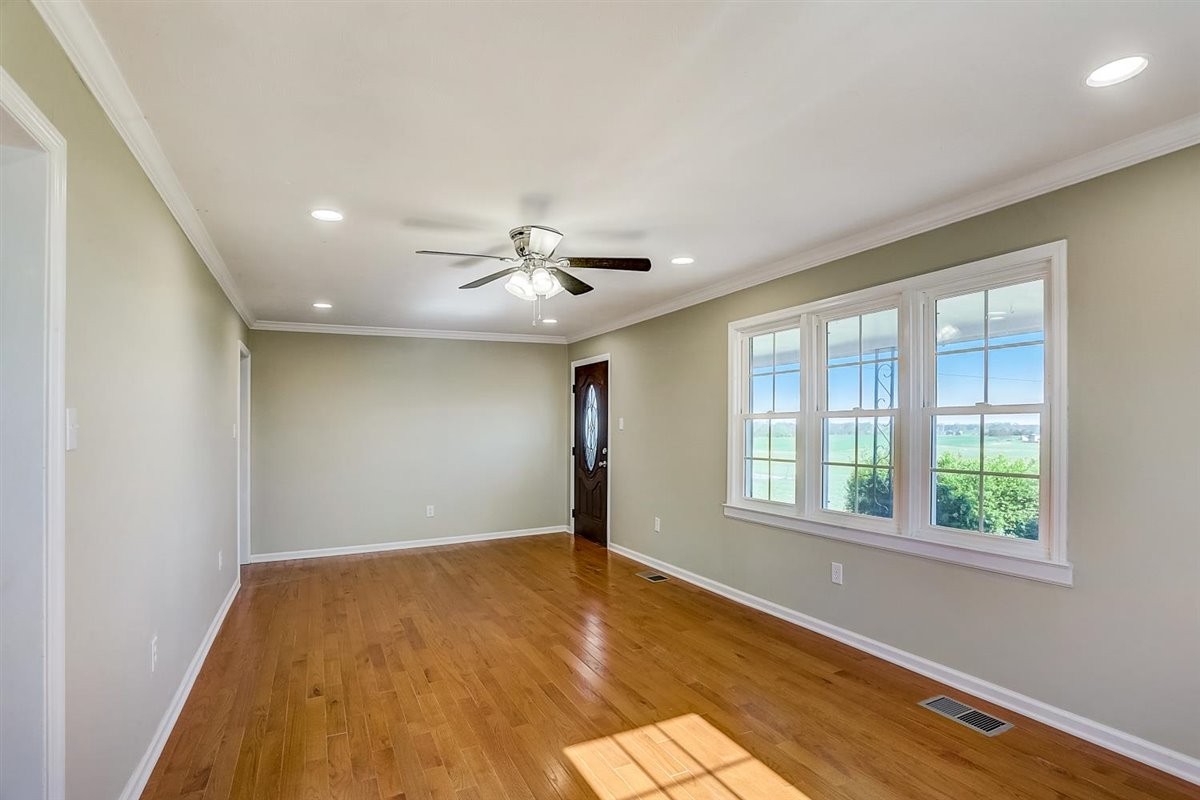 555 White Road Portland, TN 37148 - Photo 6 of 30 wooden floor in an empty room with a window