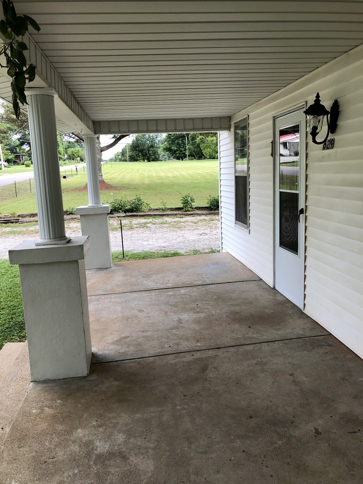 629 A Fall River Road Lawrenceburg, TN 38464 - Photo 9 of 38 a view of a porch and garden