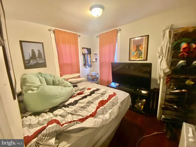 a front view of a house with parking space