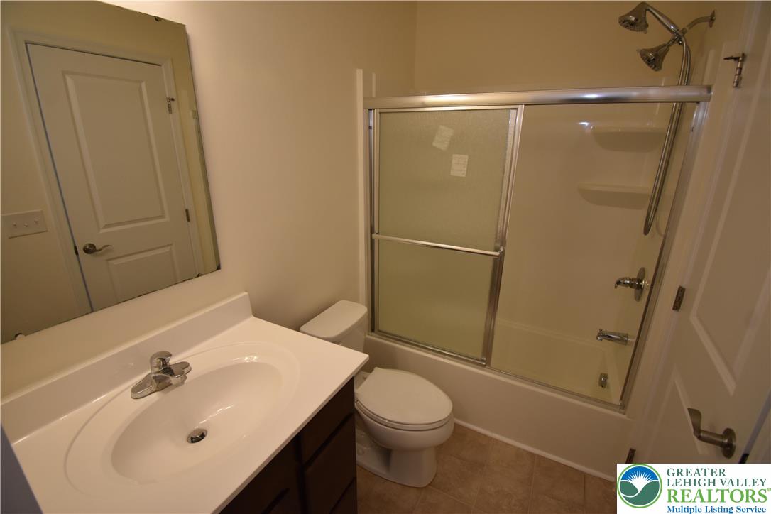 1924 Alex Road Easton, PA 18040 - Photo 16 of 22 a bathroom with a sink toilet and shower
