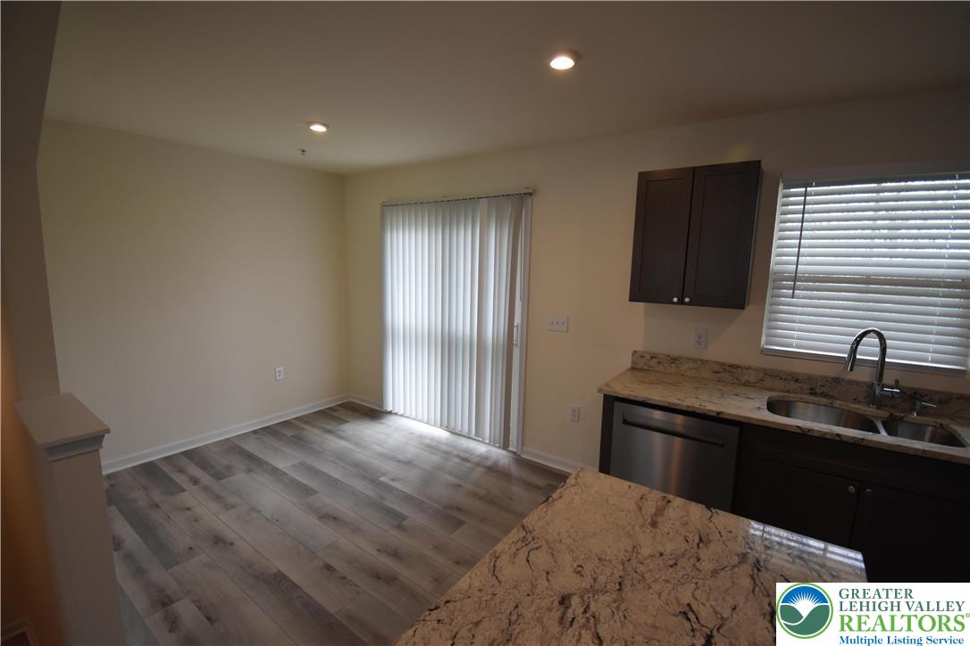1924 Alex Road Easton, PA 18040 - Photo 4 of 22 a bedroom with a sink and a mirror