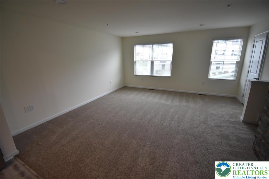 1924 Alex Road Easton, PA 18040 - Photo 7 of 22 an empty room with windows