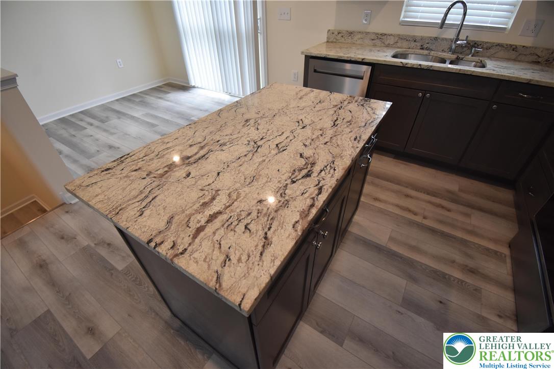 1924 Alex Road Easton, PA 18040 - Photo 8 of 22 a view of kitchen island with wooden floor