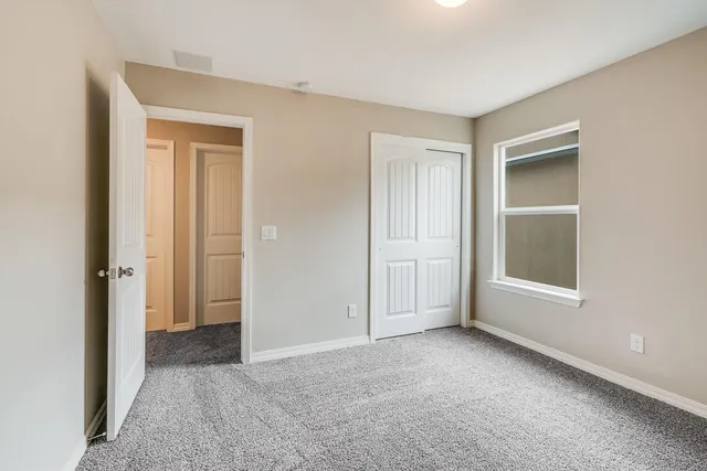 a bathroom with a sink and a large mirror