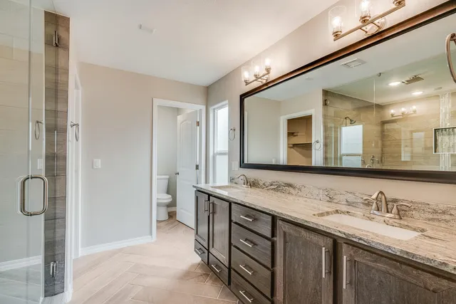 a white bath tub sitting in a bathroom