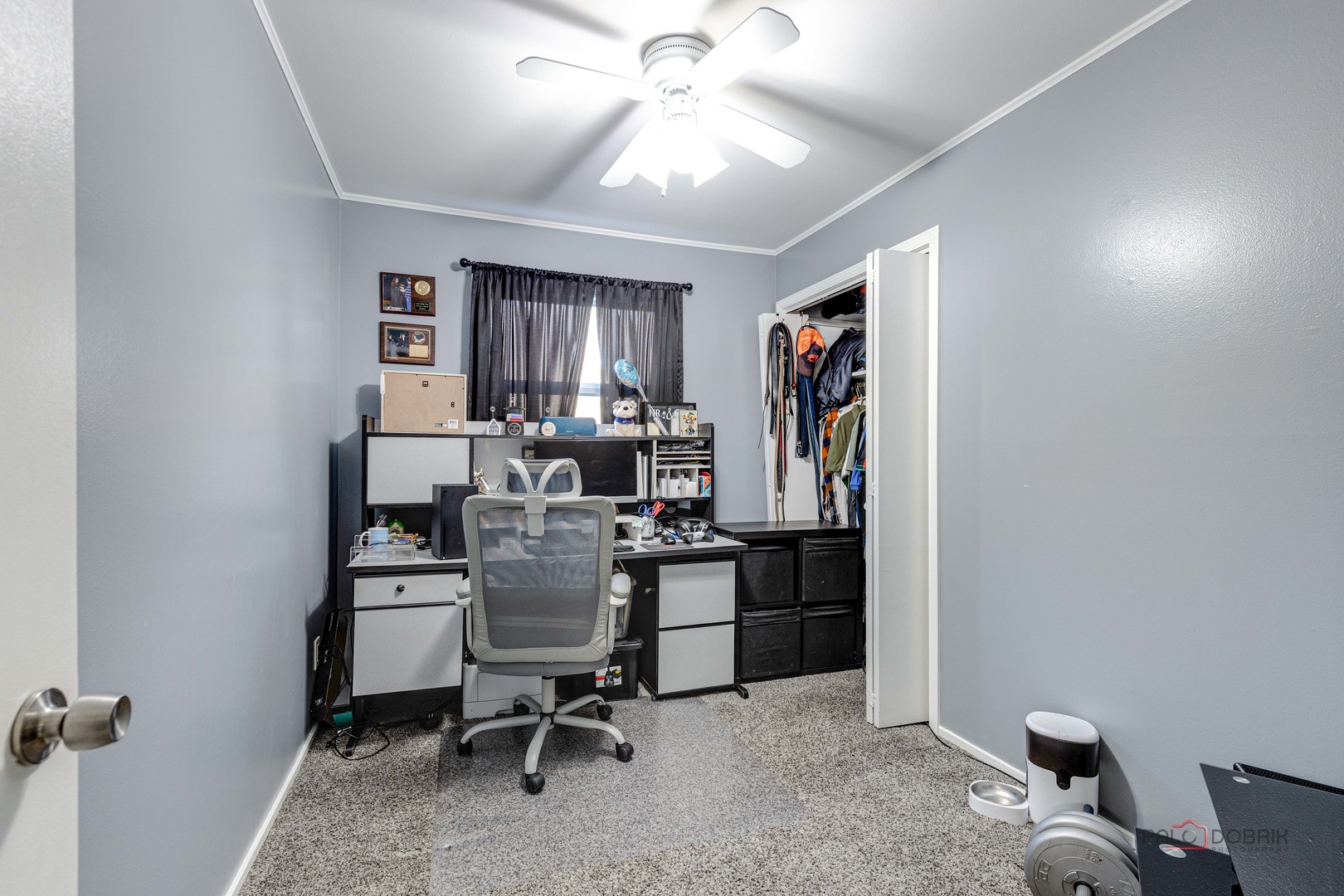 612 Kent Road McHenry, IL 60051 - Photo 13 of 18 a view of a workspace with furniture and a window