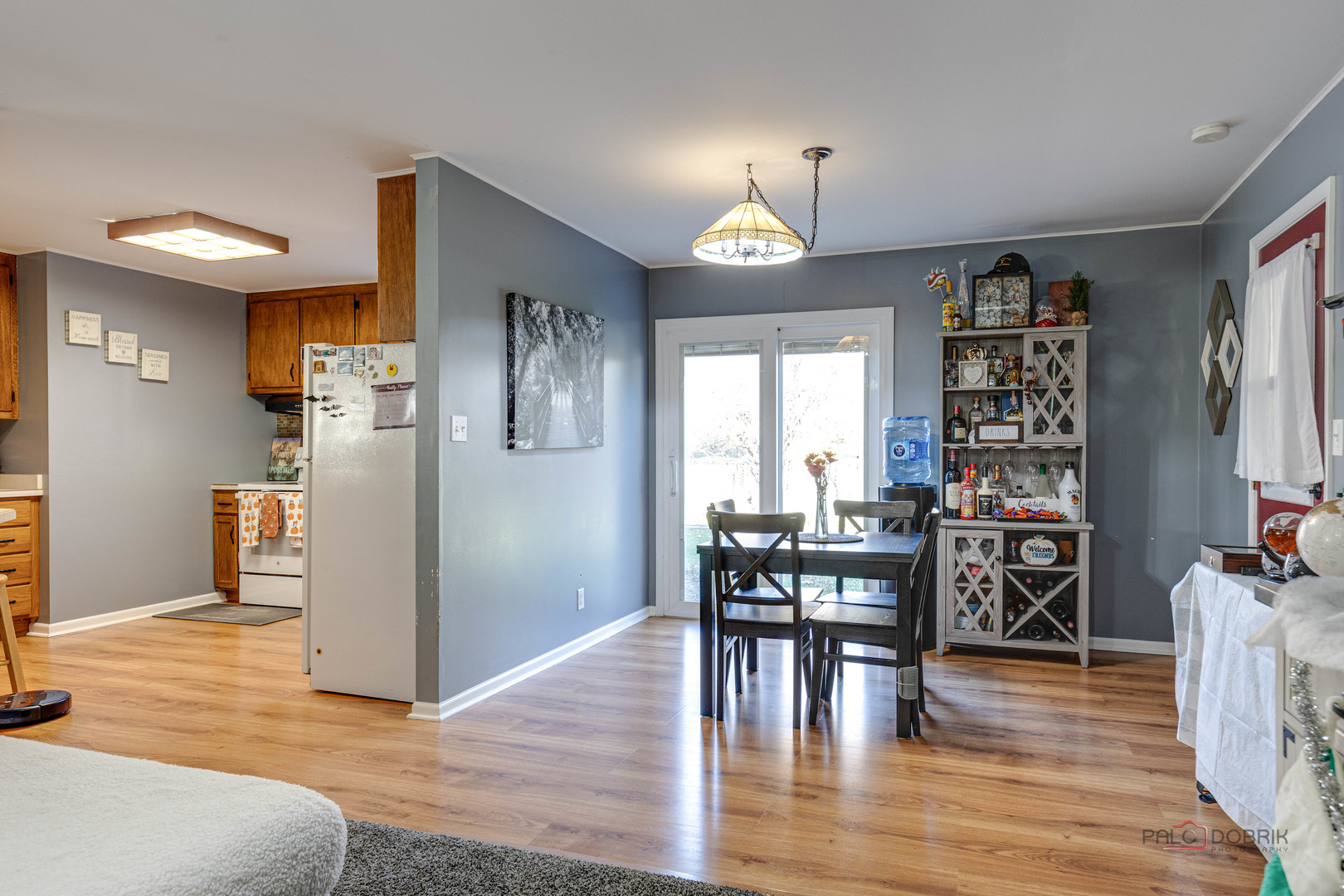 612 Kent Road McHenry, IL 60051 - Photo 5 of 18 a view of a dining room with furniture and wooden floor