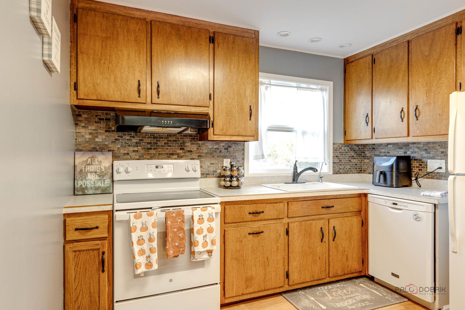 612 Kent Road McHenry, IL 60051 - Photo 9 of 18 a kitchen with granite countertop cabinets stainless steel appliances and a sink