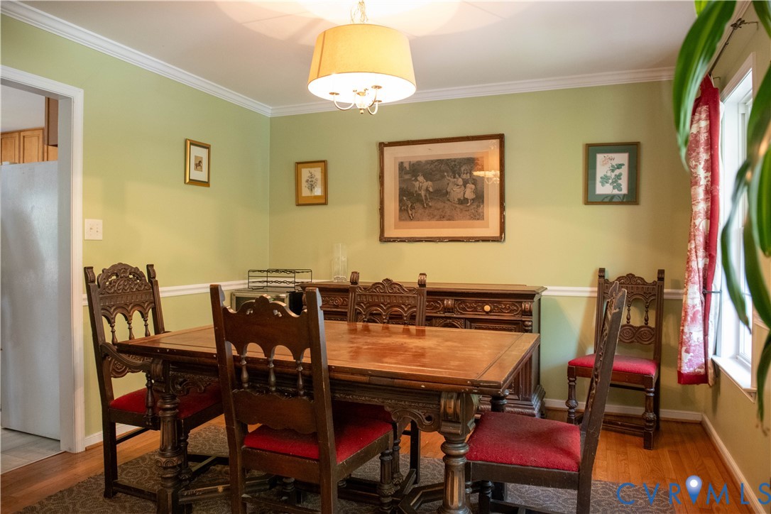 1897 Roundabout Road Louisa, VA 23093 - Photo 9 of 31 a view of a dining room with furniture and wooden floor