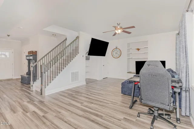 a view of entryway with wooden floor