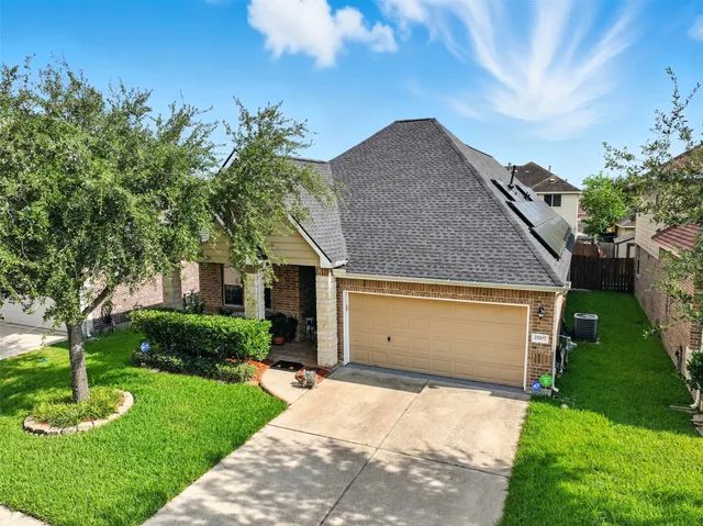 a house view with a garden space