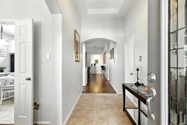 a view of a hallway view with living room view