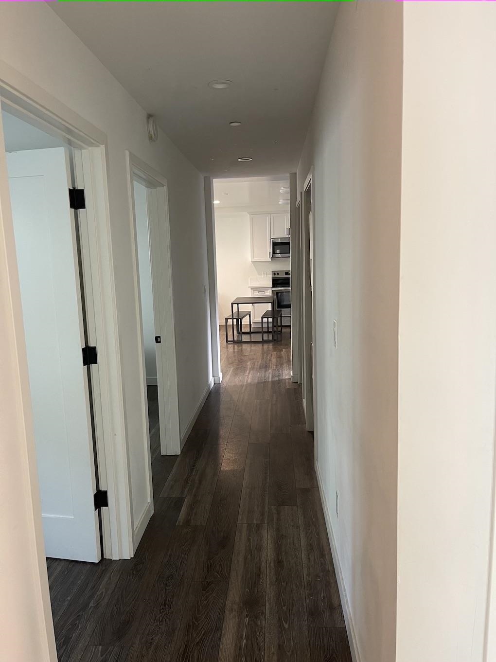 2716 Durant Avenue, Unit B Berkeley, CA 94704 - Photo 4 of 7 a view of hallway with wooden floor