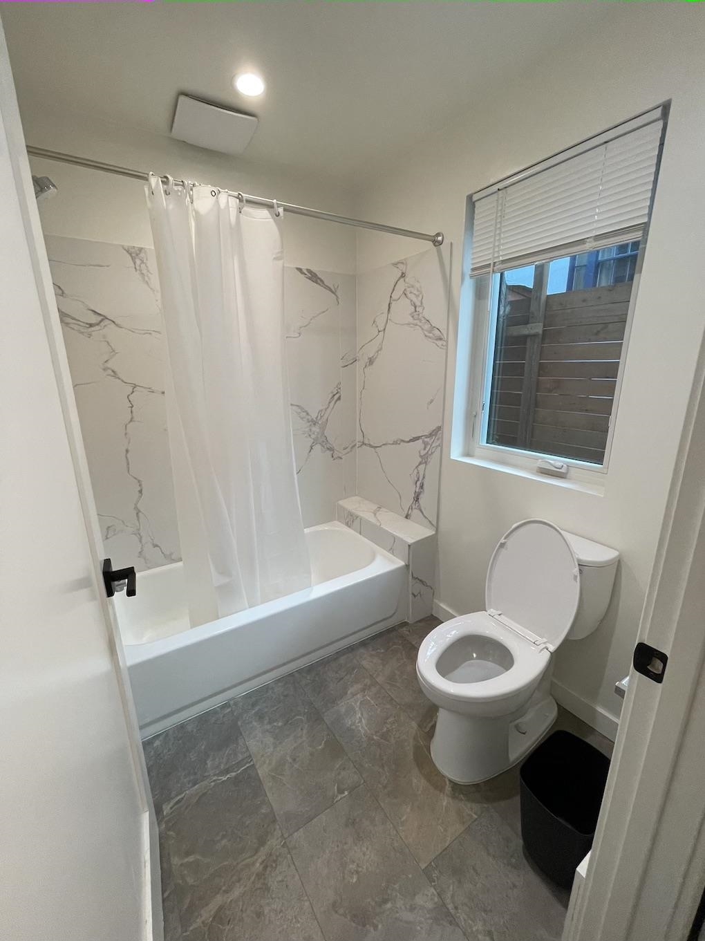 2716 Durant Avenue, Unit B Berkeley, CA 94704 - Photo 7 of 7 a bathroom with a sink toilet and shower