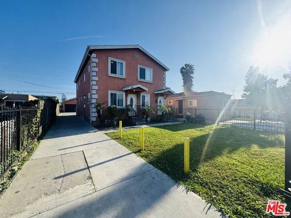 a view of a house with swimming pool