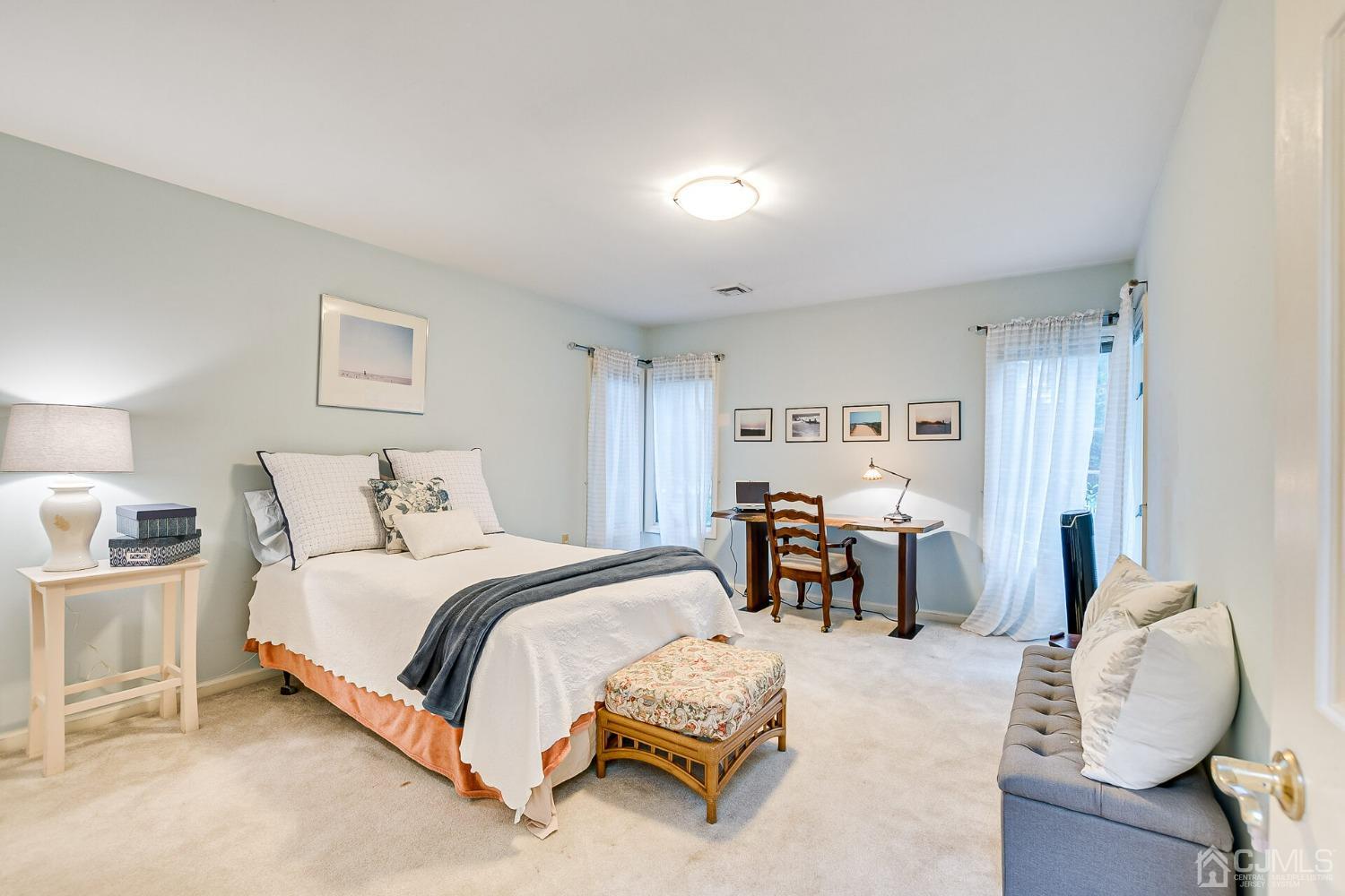 12 Clive Hills Road Edison, NJ 08820 - Photo 51 of 65 a bedroom with a bed and a couch
