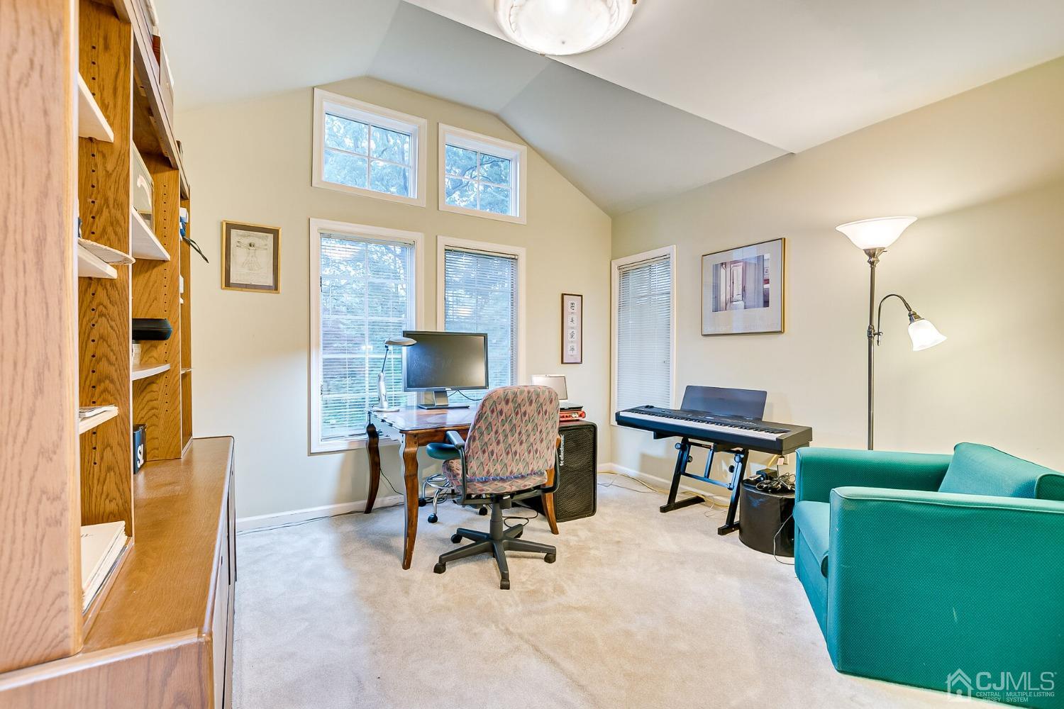 12 Clive Hills Road Edison, NJ 08820 - Photo 53 of 65 a living room with furniture and a window