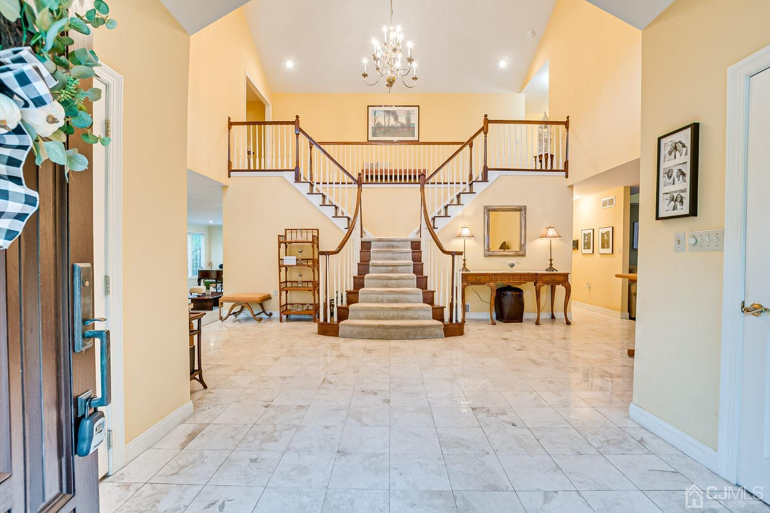 12 Clive Hills Road Edison, NJ 08820 - Photo 7 of 65 a view of a hallway with a tv