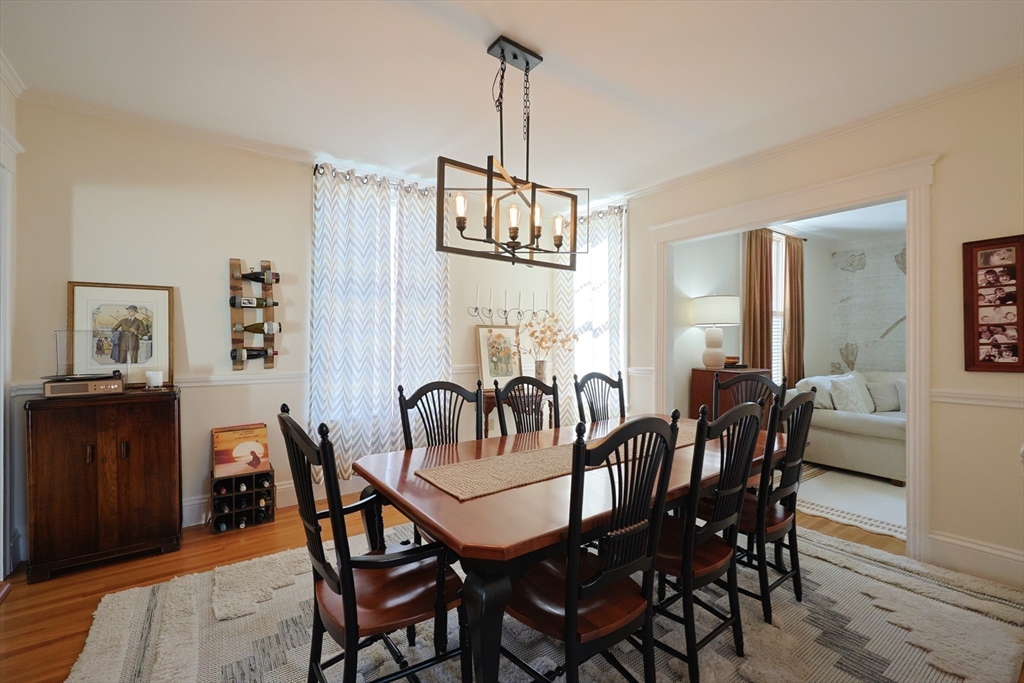 107 Minot Street Boston, MA 02122 - Photo 21 of 42 a view of a dining room with furniture window and wooden floor