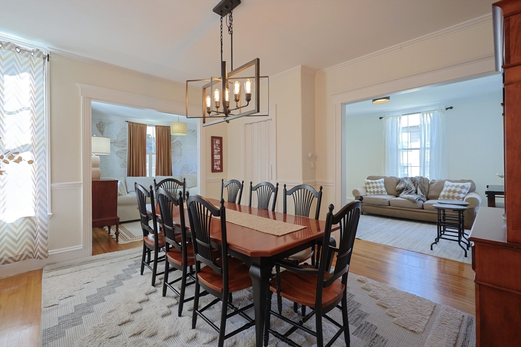 107 Minot Street Boston, MA 02122 - Photo 22 of 42 a view of a dining room with furniture window and wooden floor