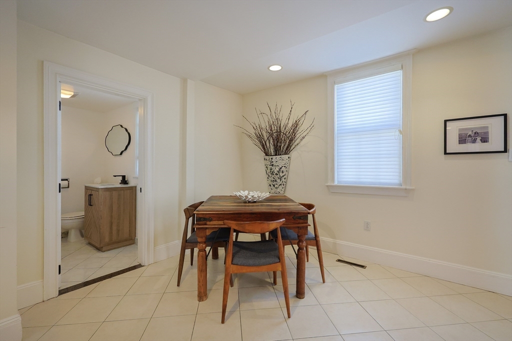 107 Minot Street Boston, MA 02122 - Photo 25 of 42 a dining room with furniture and window