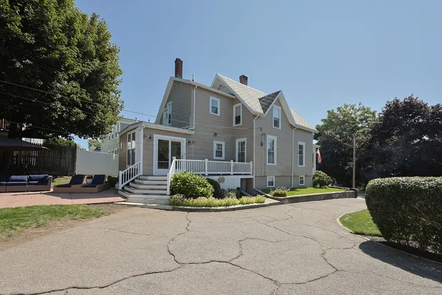 a front view of a house with entertaining space
