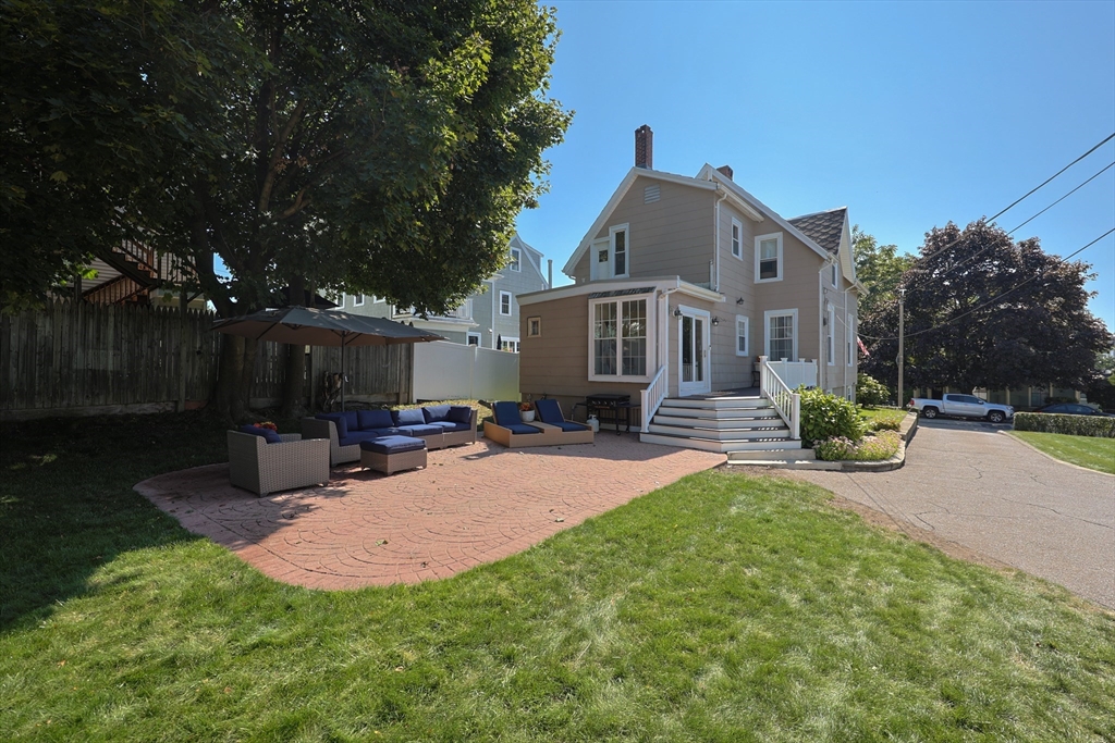 107 Minot Street Boston, MA 02122 - Photo 5 of 42 a view of a house with a yard porch and sitting area