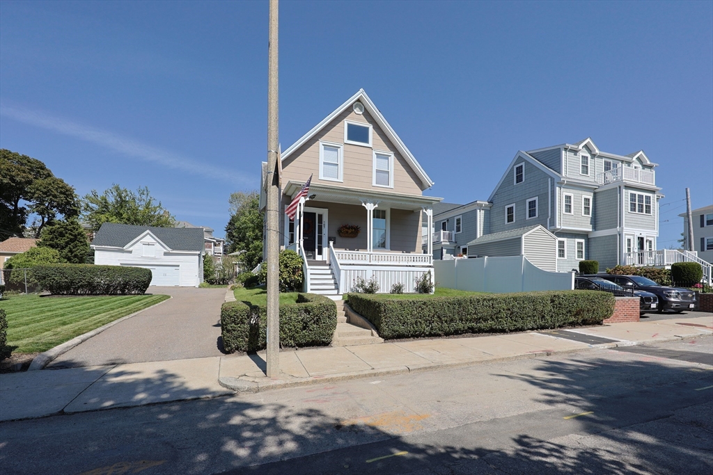 107 Minot Street Boston, MA 02122 - Photo 7 of 42 a front view of a house with a yard