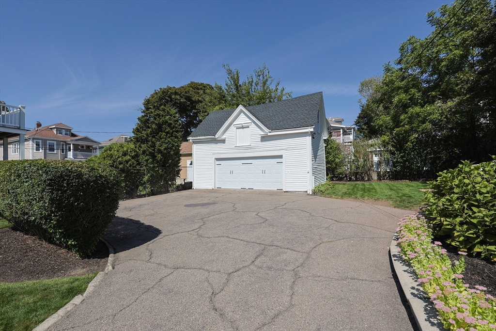 107 Minot Street Boston, MA 02122 - Photo 8 of 42 a house view with a garden space