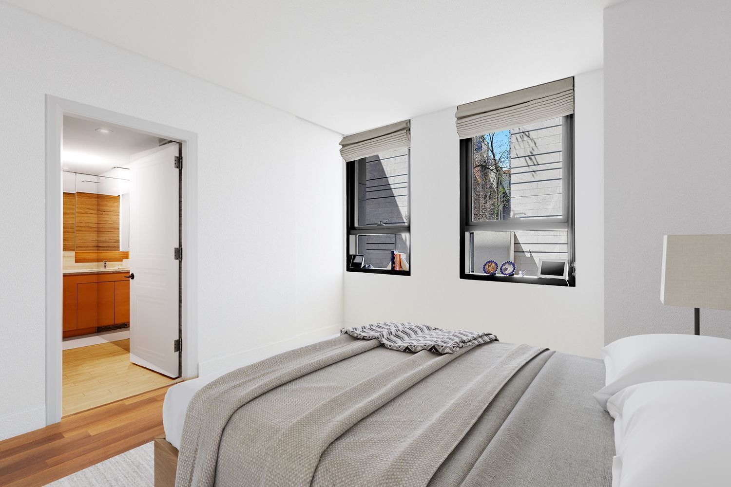 170 East End Avenue, Unit 2G Manhattan, NY 10128 - Photo 11 of 27 a bedroom with a bed and a window