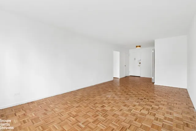 a view of a pathway with a patio