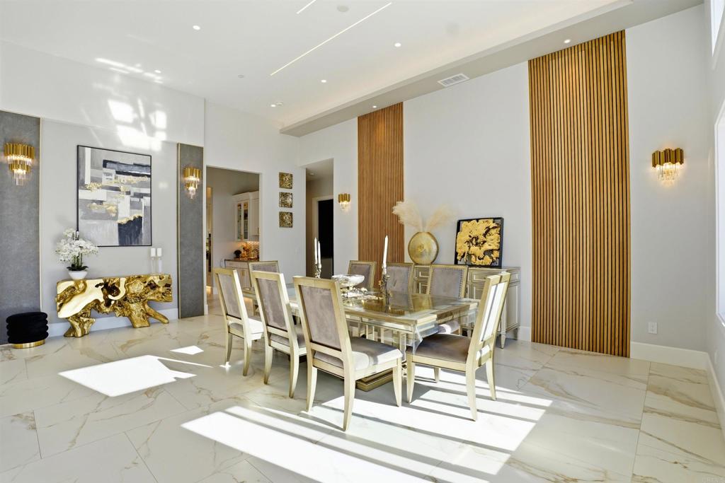 14989 Orchard View Drive Poway, CA 92064 - Photo 13 of 50 a view of a dining room with furniture